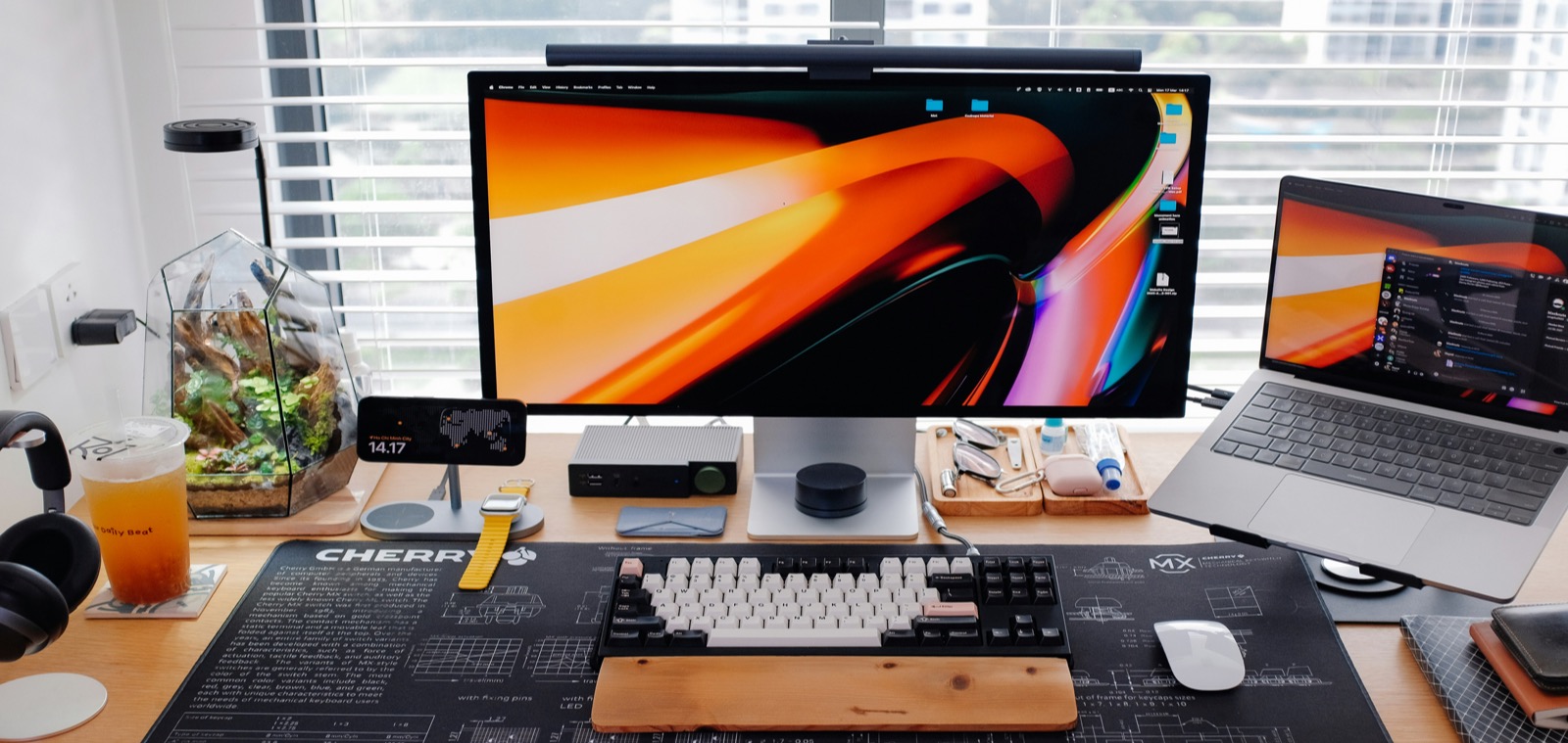 Desk setup for comparing Adobe Creative Cloud pricing and plan options