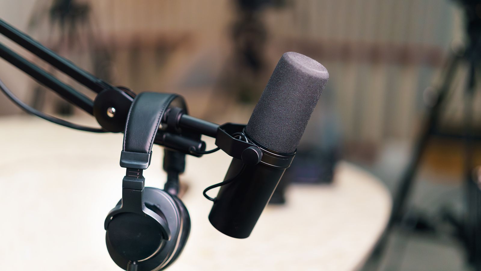 Podcast microphone and headphones ready for voice recording