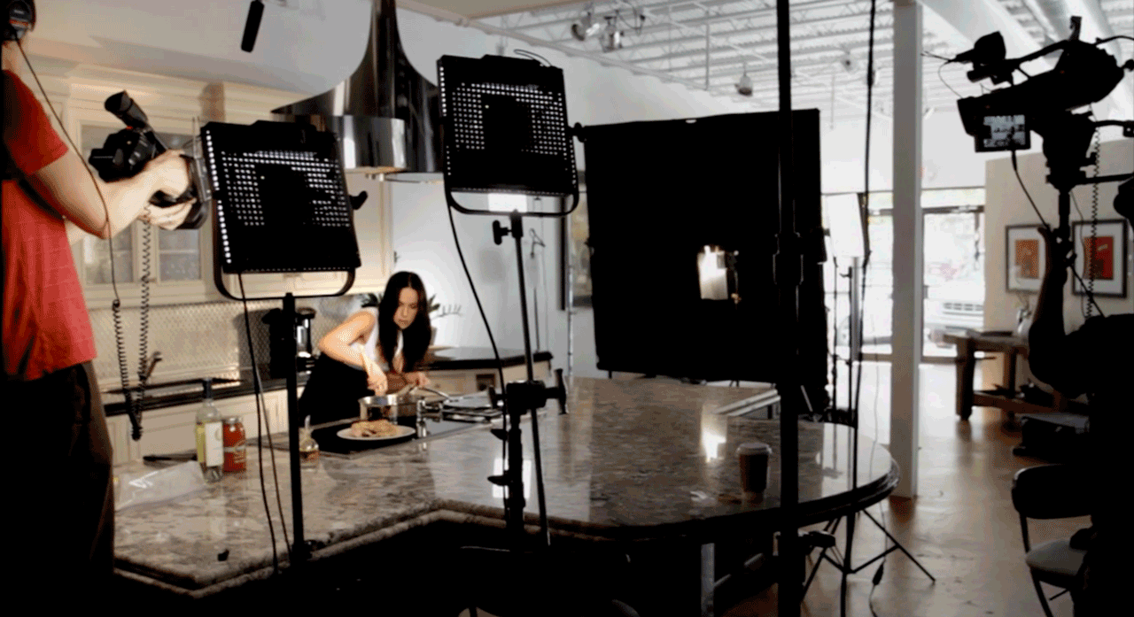 Video production set with camera and lighting